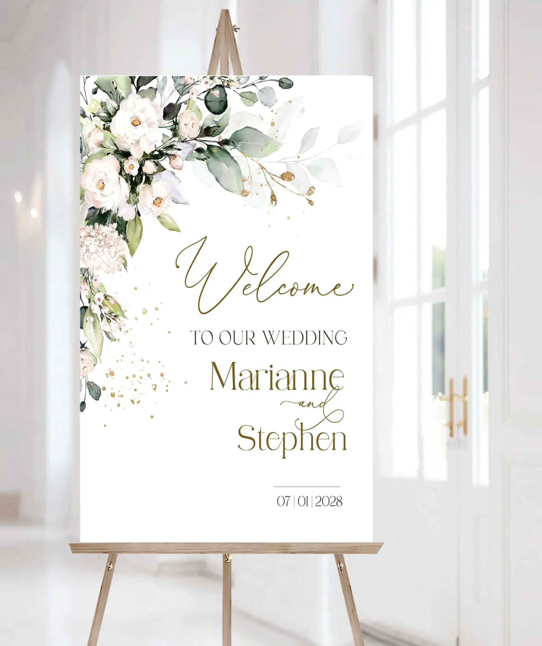 Floral wedding welcome sign on a wooden easel